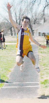 COLIN WAMBOLD competes in the the Long Jump at the Lewiston Invitational on April 9.